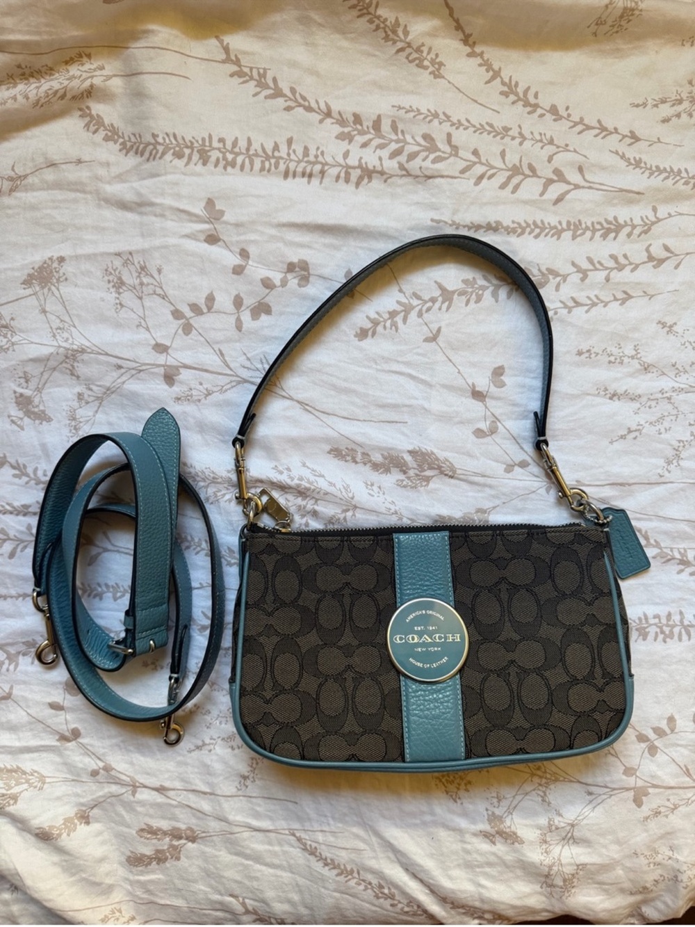 Like New Coach Lonnie Baguette
Signature in Blue Gray C8306
